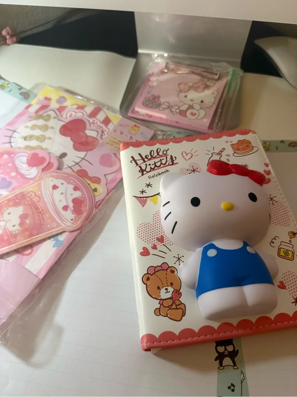 Sanrio Hello Kitty White Figure with Blue Outfit and Red Bow